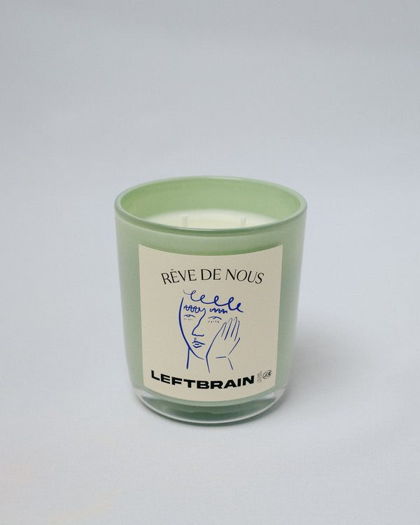 Hand-poured Reve de Nous Candle on a white background, highlighting its minimalist design and calming home fragrance.
