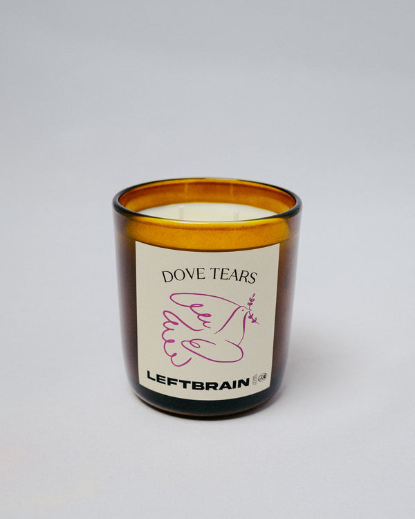 Hand-poured Dove Tears Candle on a white background, highlighting its minimalist design and calming home fragrance.