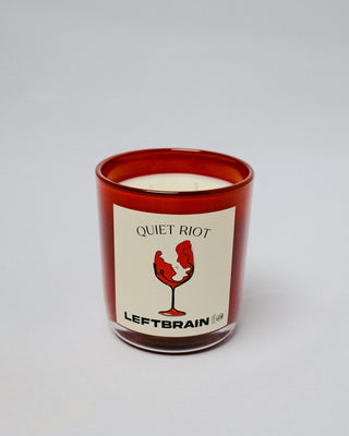 Hand-poured Quiet Riot Candle on a white background, highlighting its minimalist design and calming home fragrance.